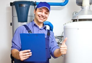 smiling,technician,servicing,an,hot water,heater